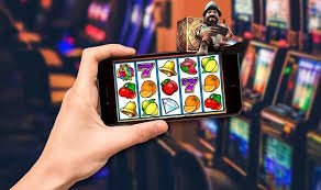 Antarmuka BandarQ live-dealer di jayaslot app dengan kartu dan area taruhan yang jelas